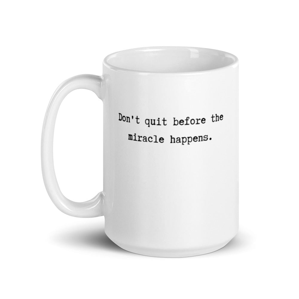 mug with typewriter font quote don't quit before the miracle happens white ceramic 15 oz. printed both sides