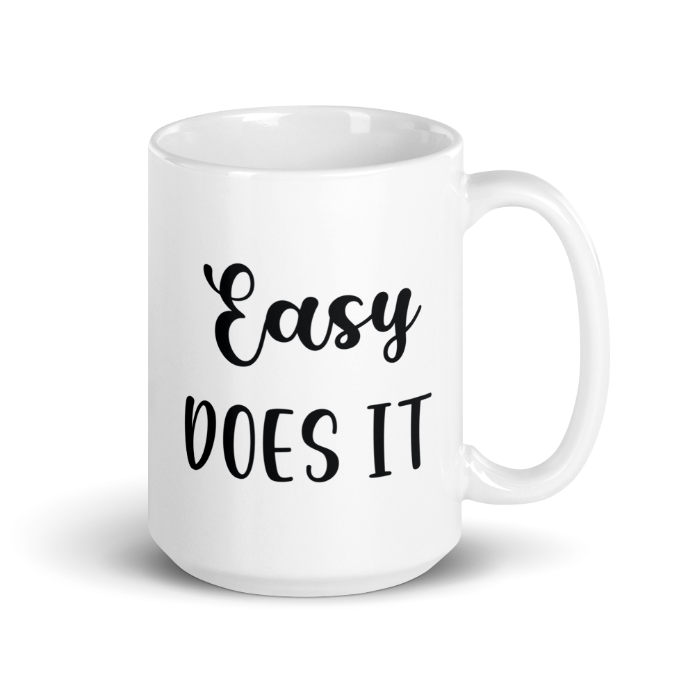 white ceramic coffee mug easy does it saying 11 and 15 ounce