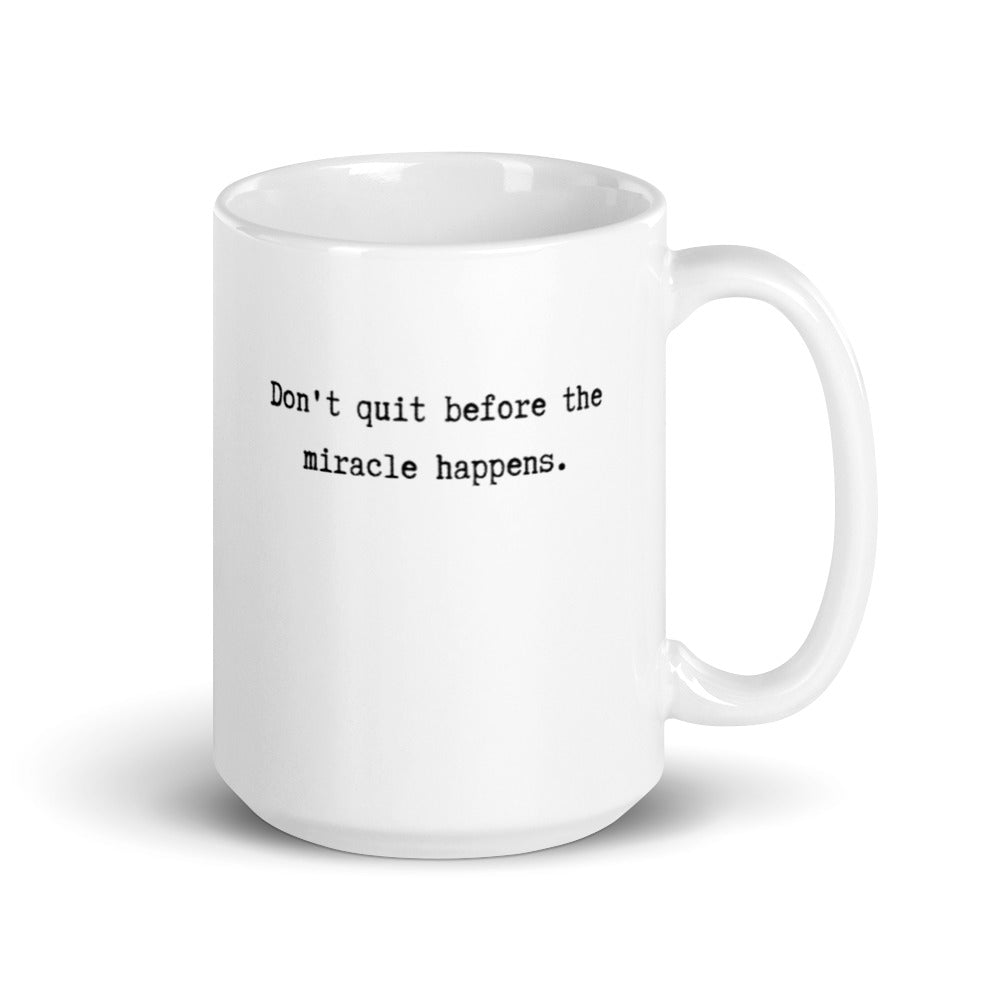 mug with typewriter font quote don't quit before the miracle happens white ceramic 15 oz. printed both sides