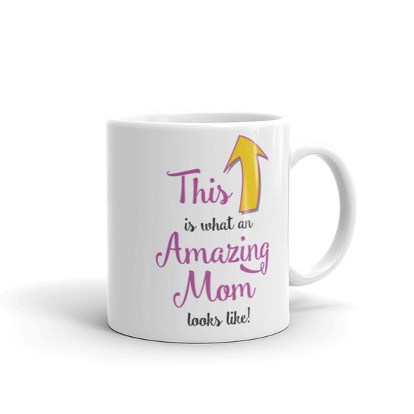 coffee mug with with a large golden arrow pointing upwards and the text saying this is what an amazing mom looks like glossy white 11 oz. and 15 oz. printed both sides