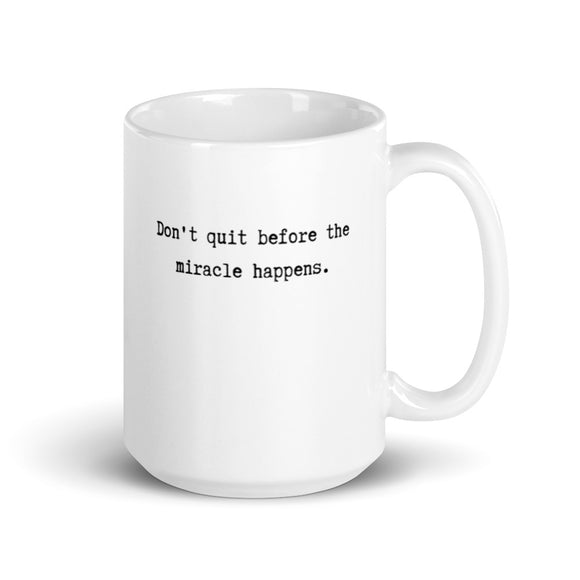 mug with typewriter font quote don't quit before the miracle happens white ceramic 15 oz. printed both sides